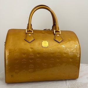 Extremely Worn, with Dark Marks MCM Gold Boston Patent-Leather Handbag